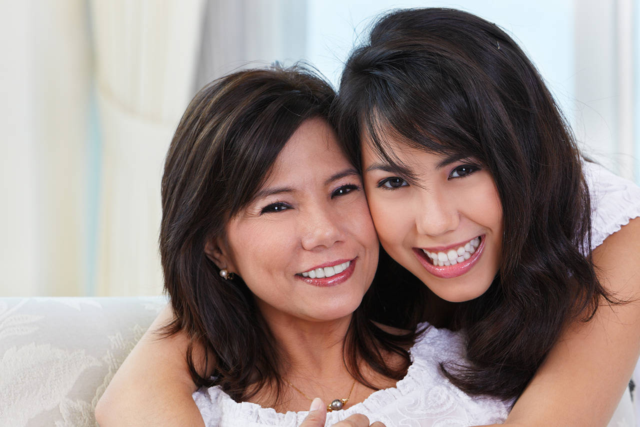 mother and daughter with youthful skin