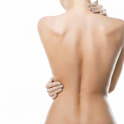 thin sculpted woman's back