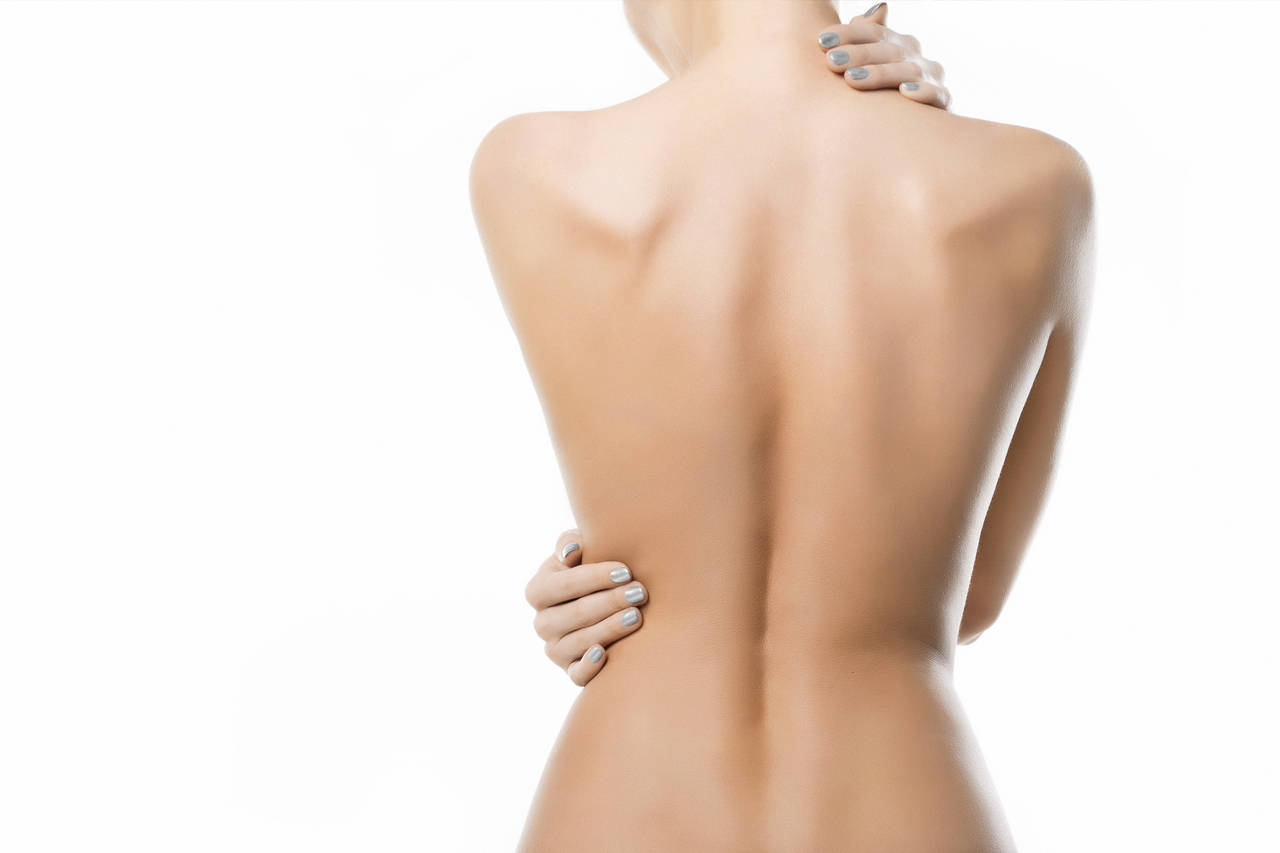 thin sculpted woman's back