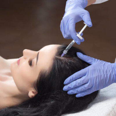 woman receiving scalp injection