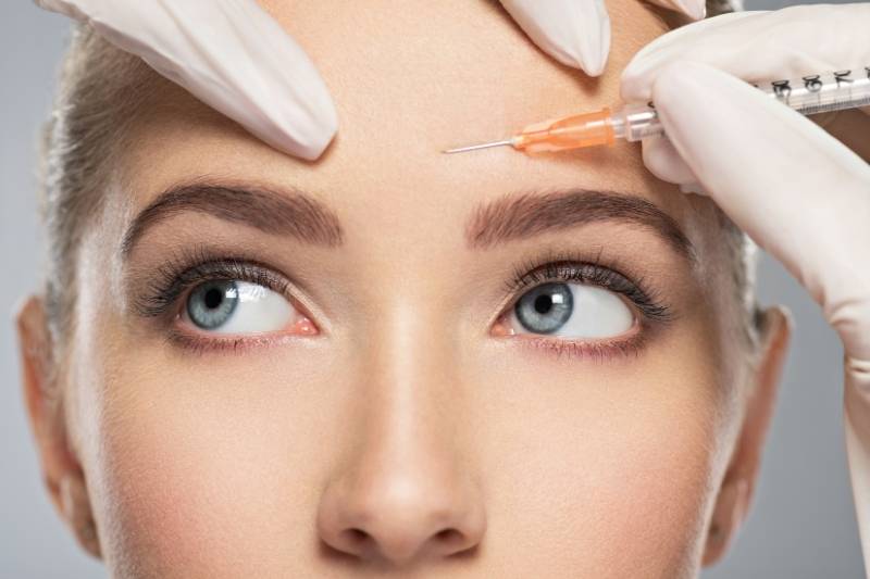 botox injection women getting needle injection
